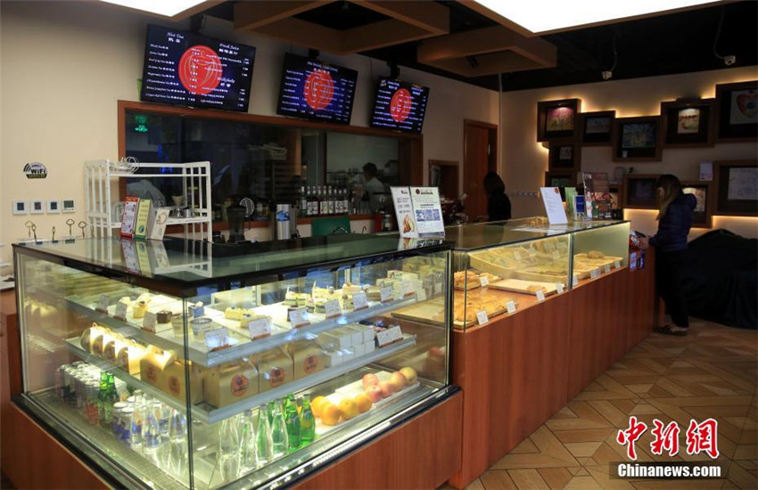 Das w?rmste Café Shanghais: Mitarbeiter aus AIDS-Familien