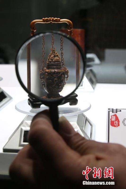 Weifanger Pfirsichkern-Schnitzereien in Taipeh