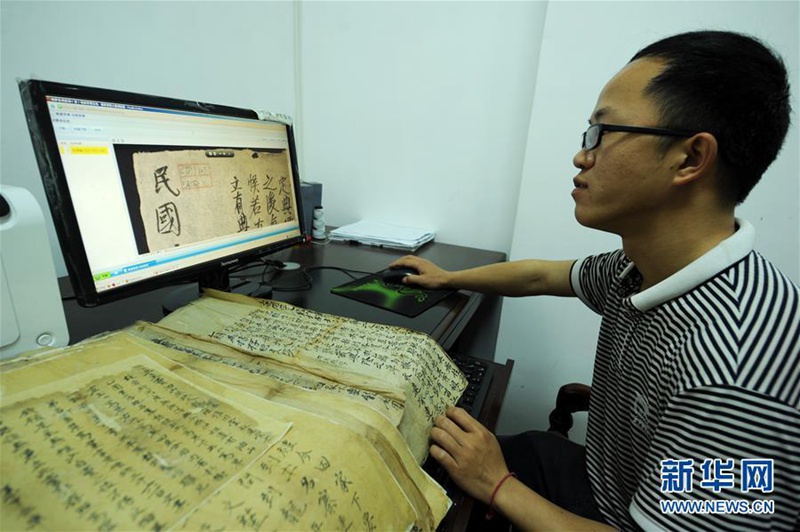 Junge Restauratoren für den Erhalt der Jinping-Aufzeichnung